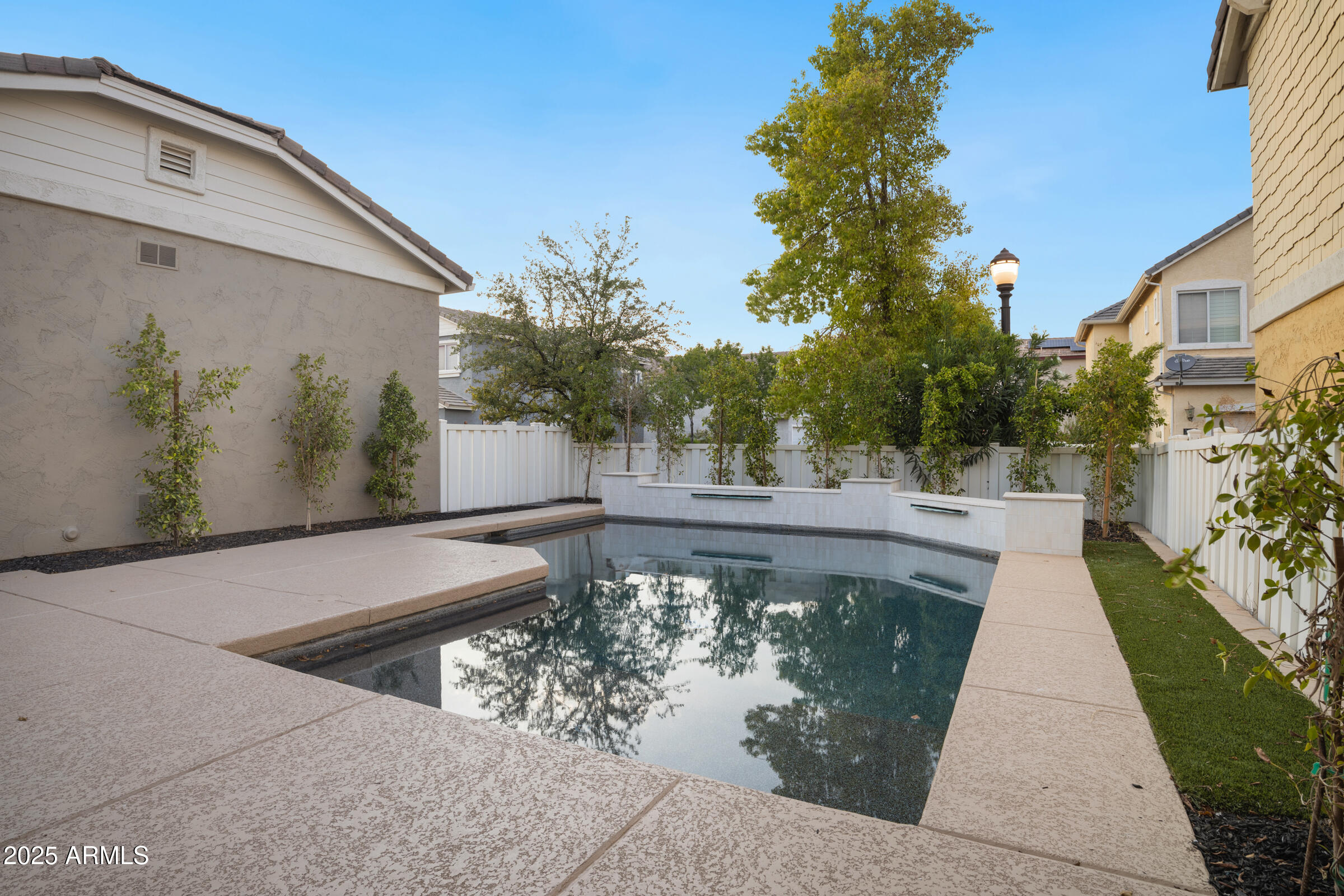 3102 East Agritopia Loop North Gilbert, AZ 85296 - Photo 50 of 75 a view of a back yard of a house