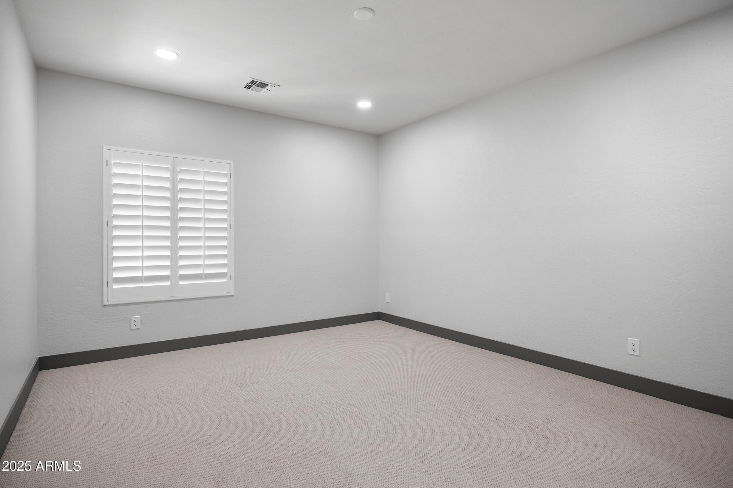 3102 East Agritopia Loop North Gilbert, AZ 85296 - Photo 56 of 75 an empty room with a window