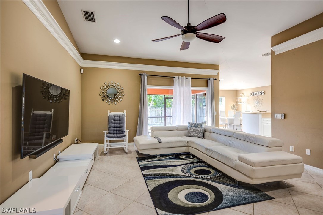 9036 Henry Road Fort Myers, FL 33967 - Photo 4 of 22 a living room with furniture and a window