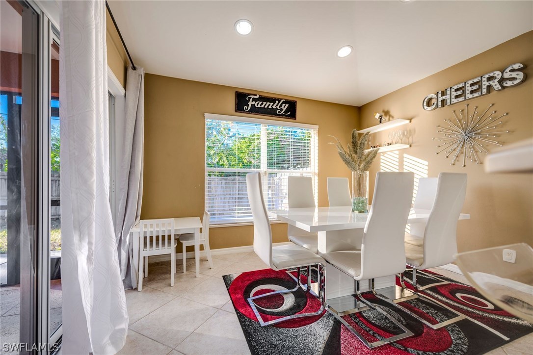 9036 Henry Road Fort Myers, FL 33967 - Photo 10 of 22 a view of a room with furniture and wooden floor