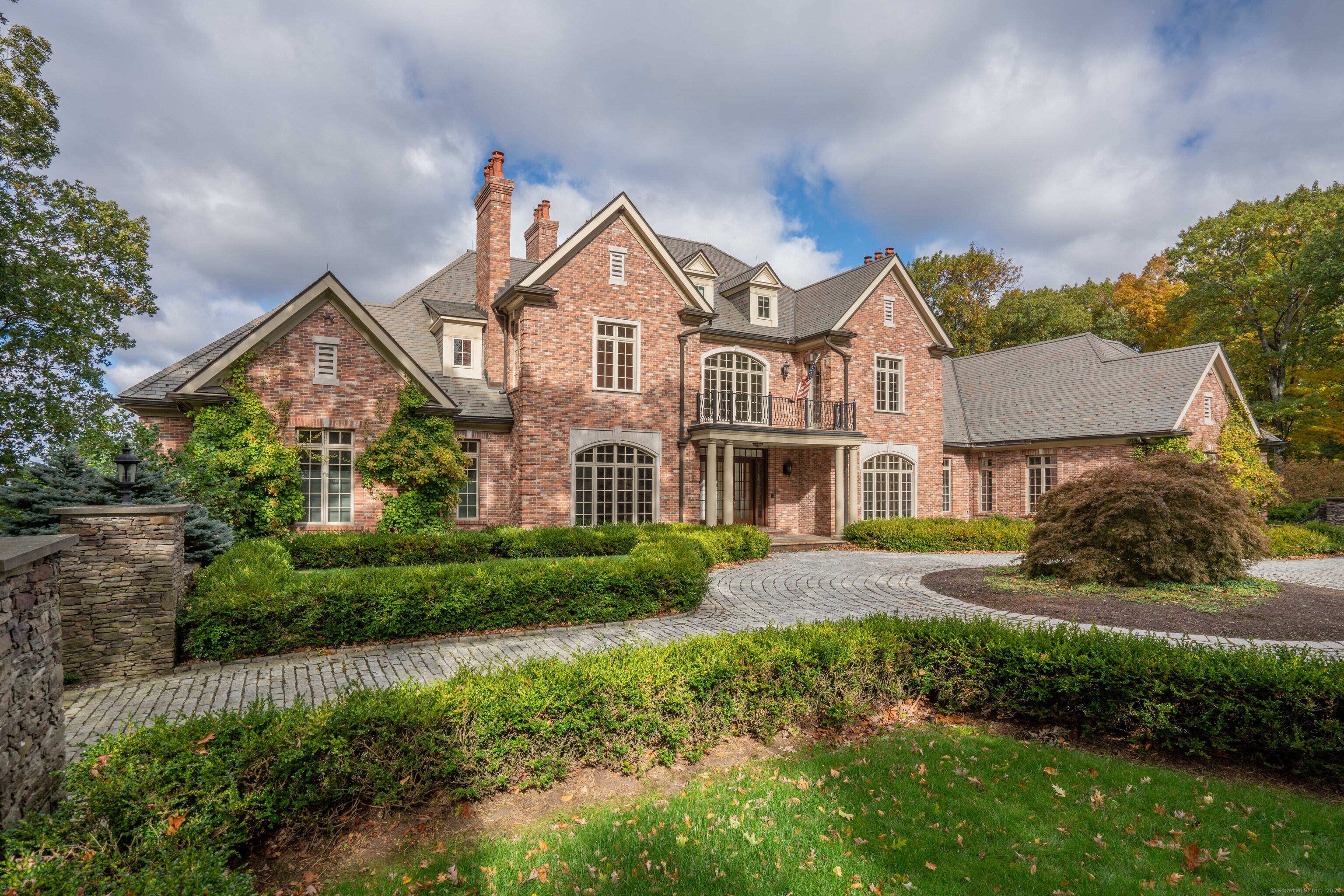 217 Deercliff Road Avon, CT 06001 - Photo 1 of 1 a front view of a house with a yard