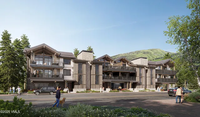 a view of a big building and a street