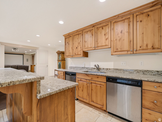 1279 West 1500th Street North Mapleton, UT 84664 - Photo 58 of 83 Full kitchen featuring wood-finish cabinetry, granite countertops, stainless steel dishwasher, and tile flooring