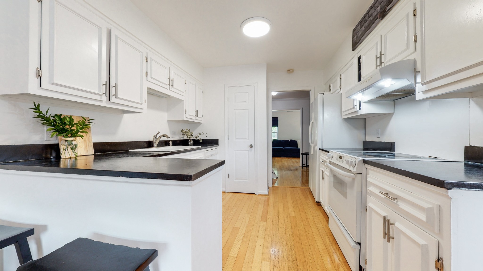 839 General George Patton Road Nashville, TN 37221 - Photo 14 of 59 a kitchen with stainless steel appliances granite countertop a sink and cabinets
