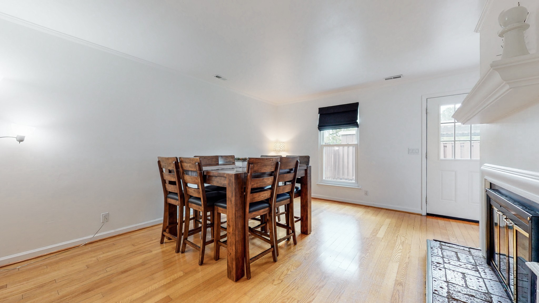 839 General George Patton Road Nashville, TN 37221 - Photo 19 of 59 a view of a dining room with furniture and wooden floor