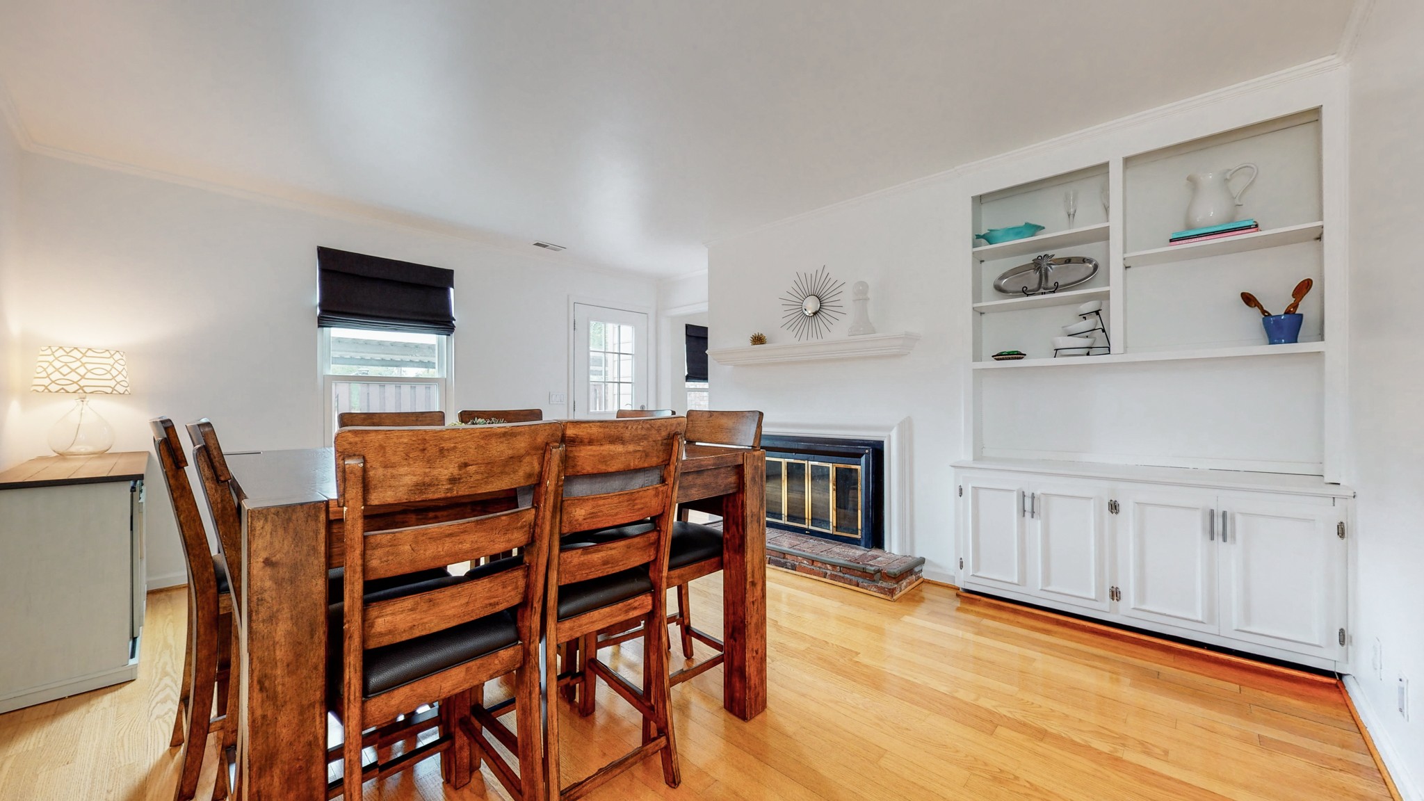839 General George Patton Road Nashville, TN 37221 - Photo 20 of 59 a view of a dining room with furniture and wooden floor
