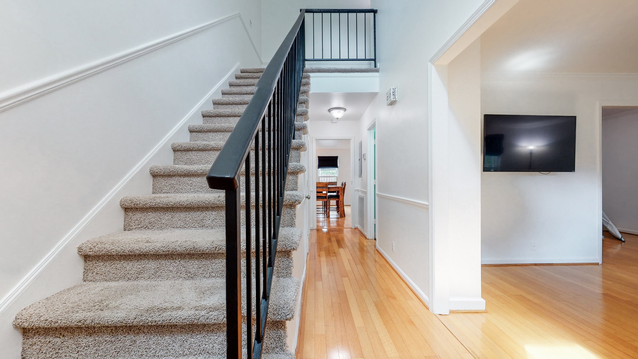 839 General George Patton Road Nashville, TN 37221 - Photo 2 of 59 a view of a hallway with wooden floor and staircase