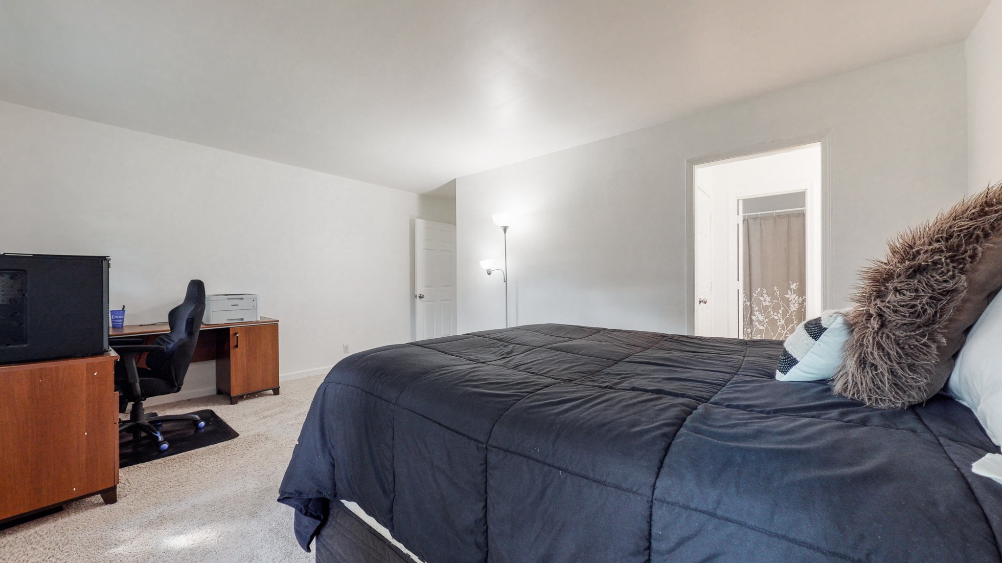 839 General George Patton Road Nashville, TN 37221 - Photo 25 of 59 a bedroom with a bed and a computer on a desk