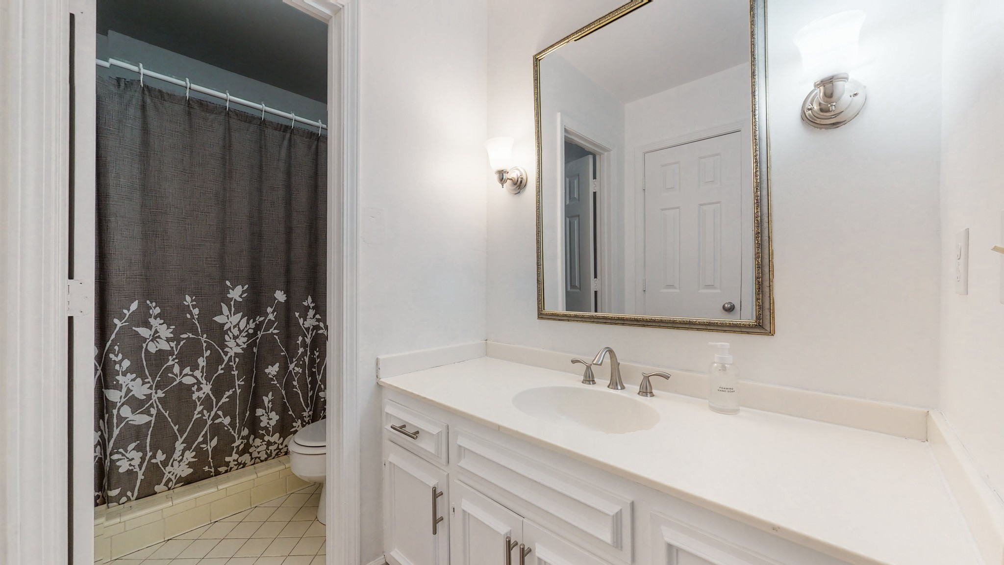 839 General George Patton Road Nashville, TN 37221 - Photo 27 of 59 a bathroom with a sink and a mirror
