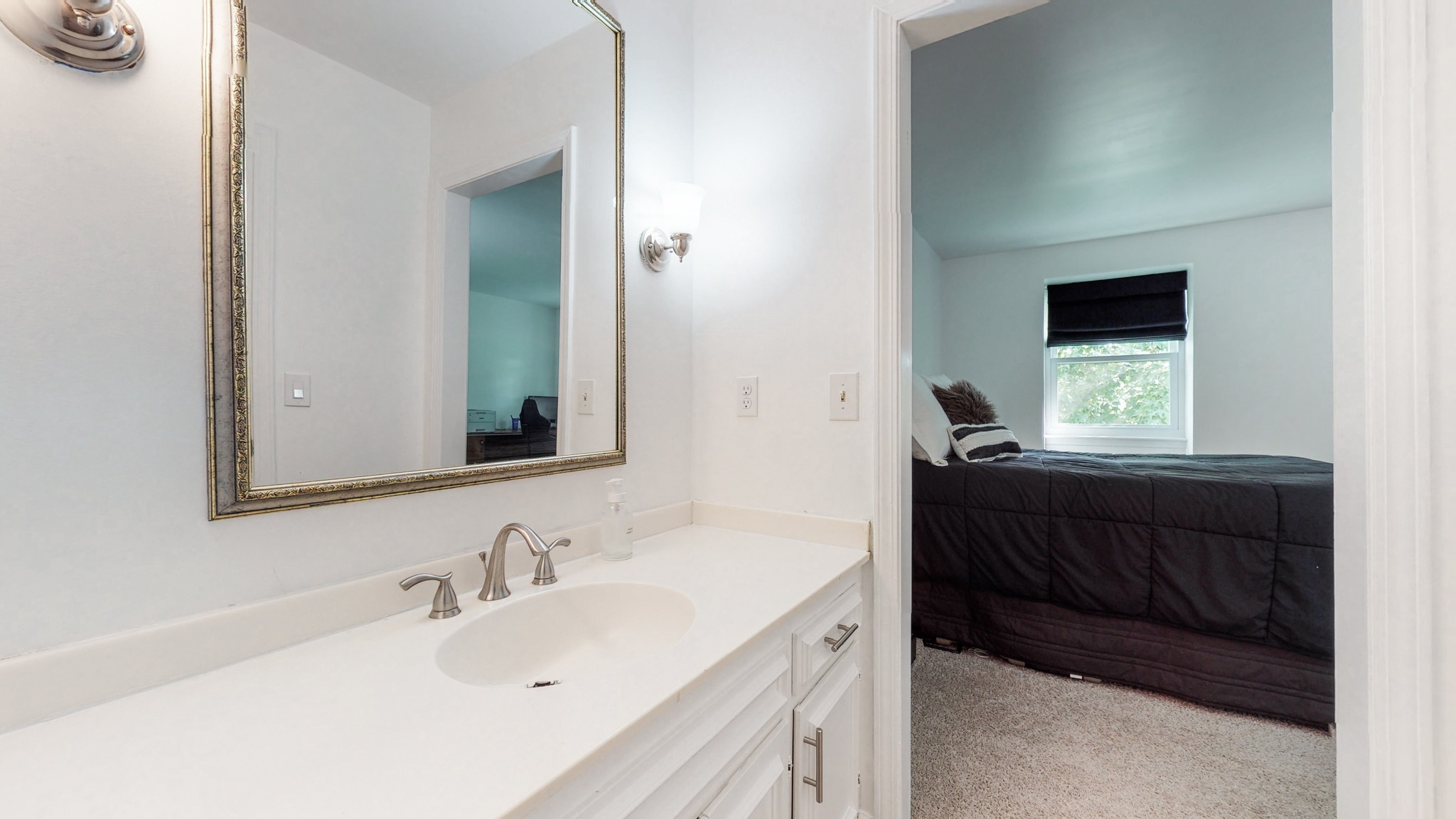 839 General George Patton Road Nashville, TN 37221 - Photo 28 of 59 a bathroom with a sink and a mirror