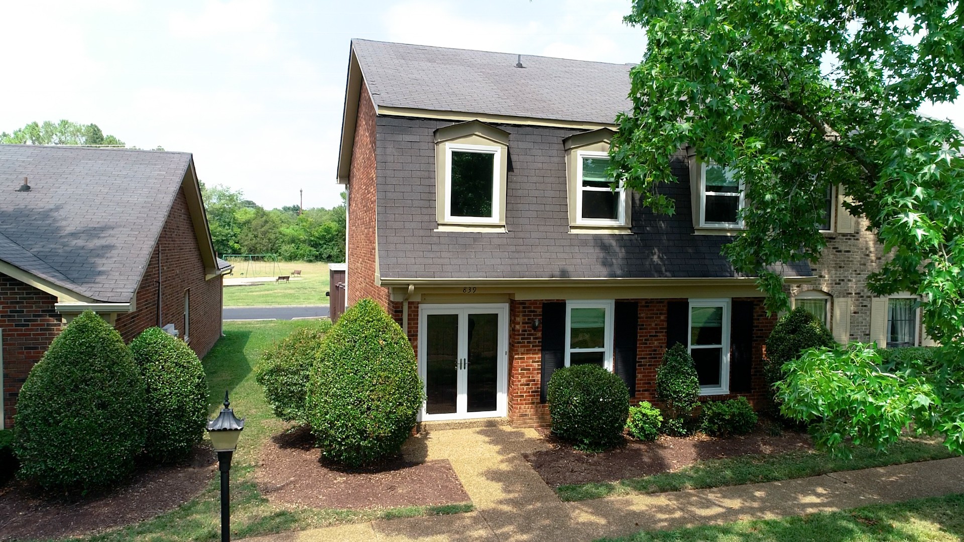 839 General George Patton Road Nashville, TN 37221 - Photo 53 of 59 a front view of a house with garden