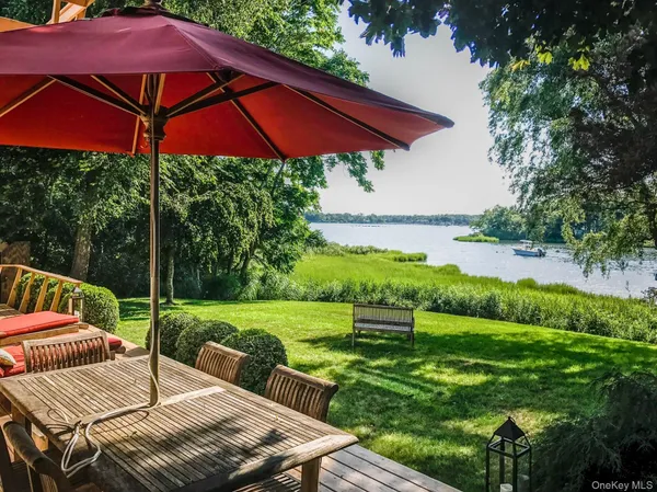 a view of yard with patio