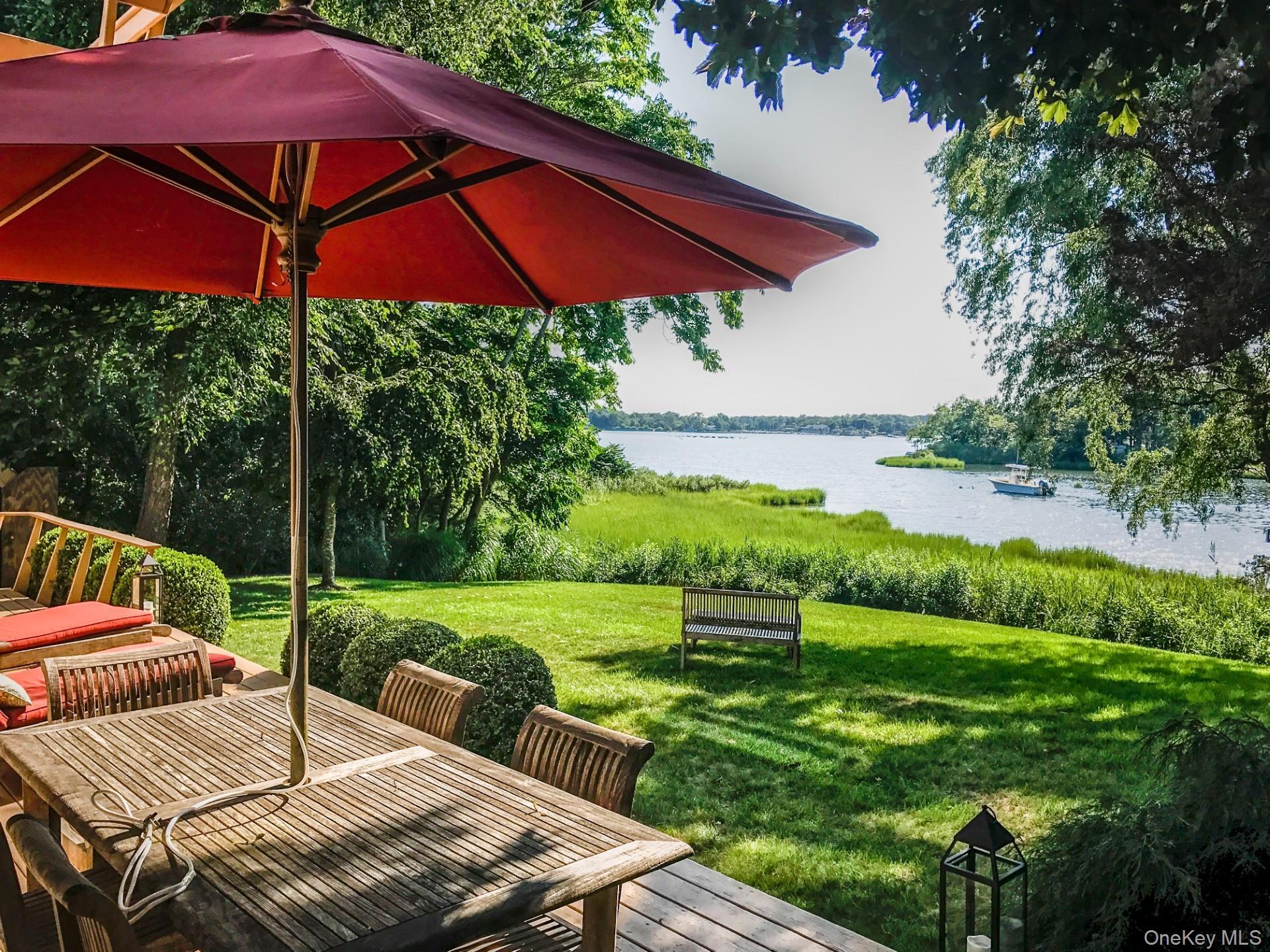 a view of yard with patio