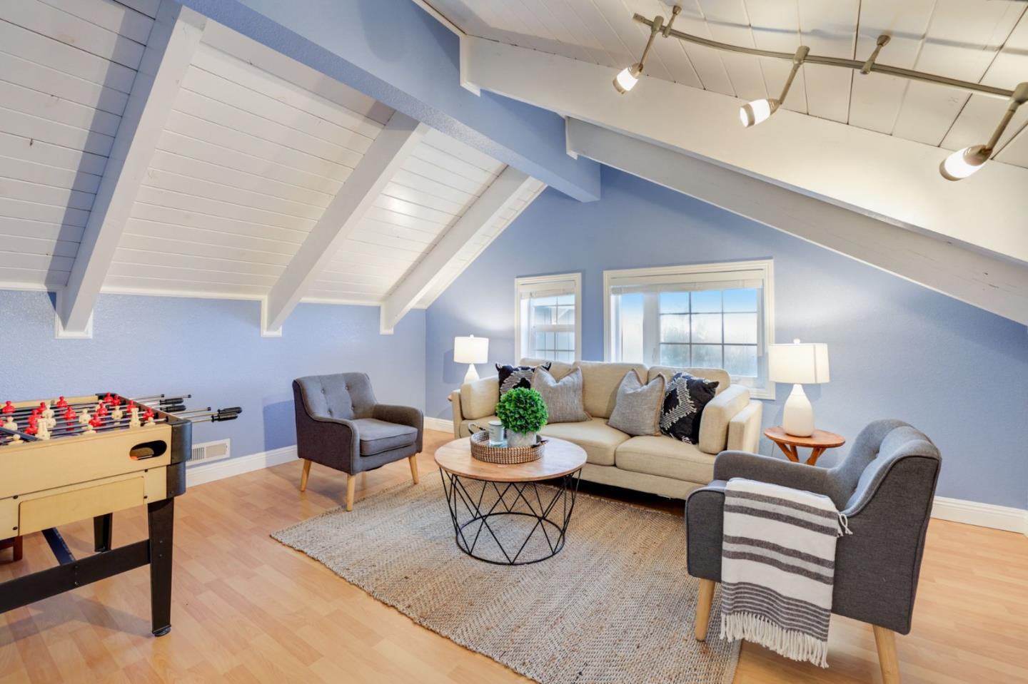3303 Americus Drive San Jose, CA 95148 - Photo 31 of 51 a living room with furniture a rug and white walls