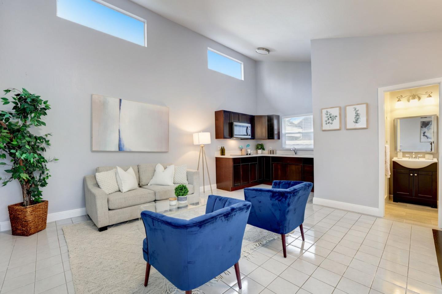 3303 Americus Drive San Jose, CA 95148 - Photo 34 of 51 a living room with furniture and a potted plant