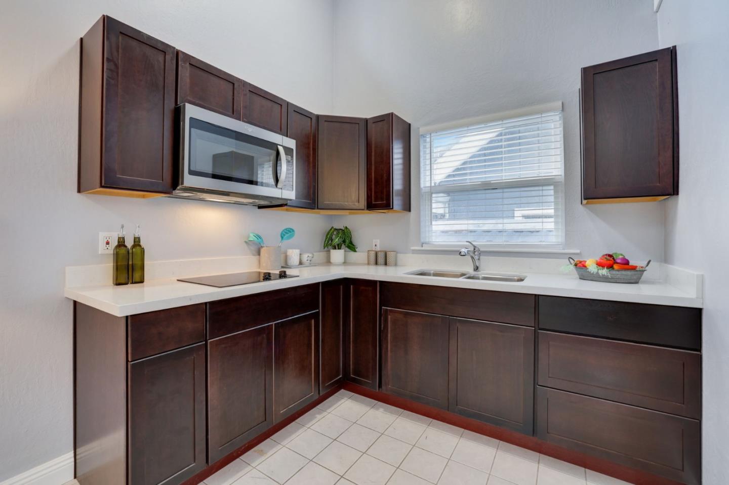3303 Americus Drive San Jose, CA 95148 - Photo 37 of 51 a kitchen with a sink cabinets and stainless steel appliances