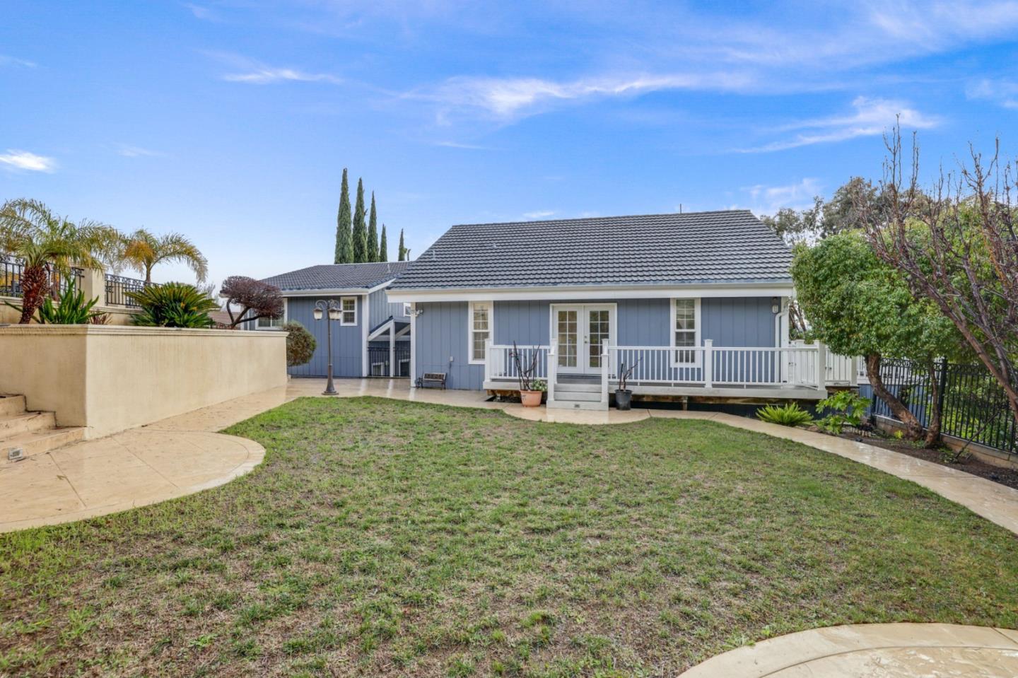 3303 Americus Drive San Jose, CA 95148 - Photo 46 of 51 a front view of a house with swimming pool having outdoor seating
