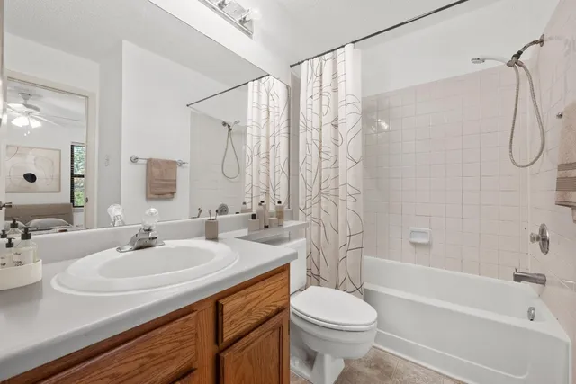 a bathroom with a sink a toilet and a bathtub