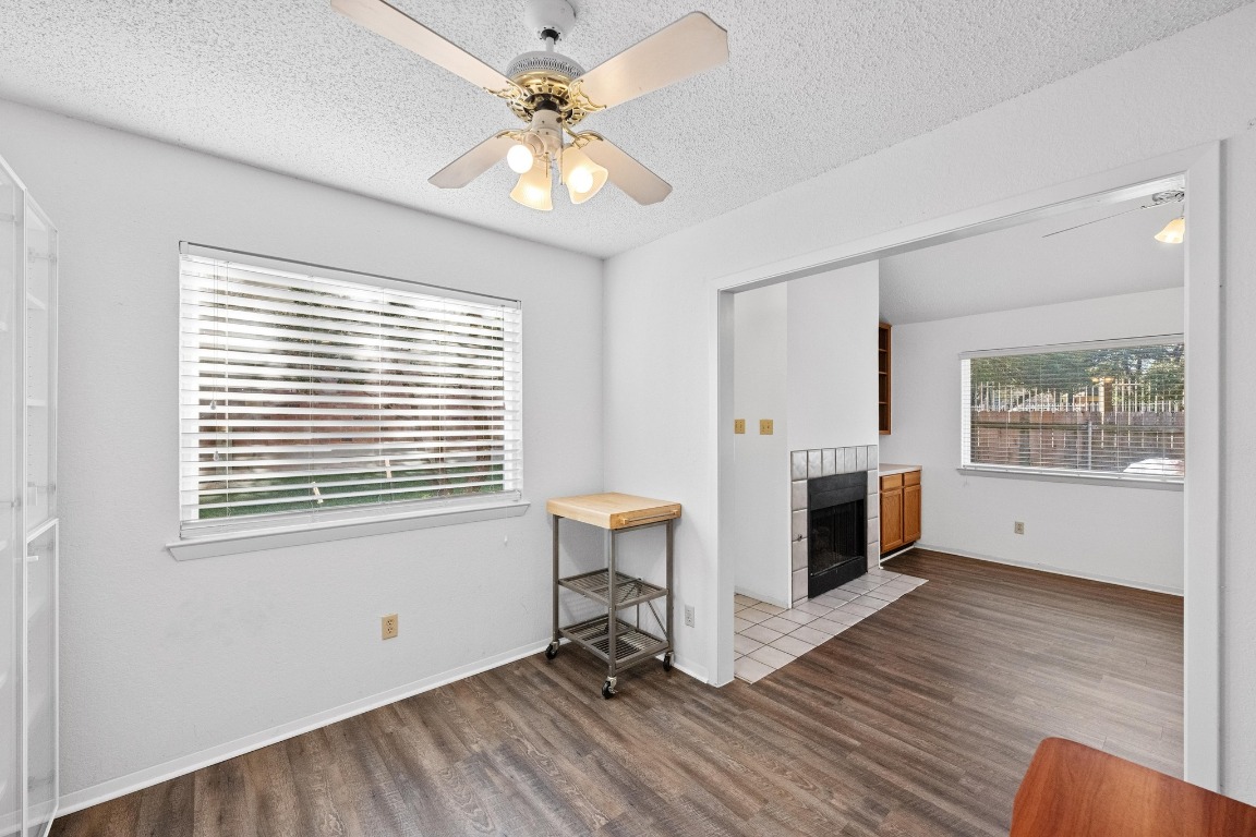 11901 Swearingen Drive, Unit 39 Austin, TX 78758 - Photo 16 of 25 a view of livingroom with furniture wooden floor and window