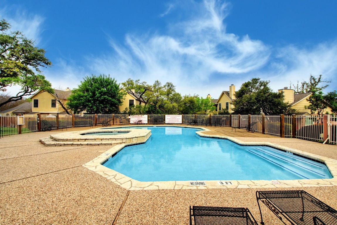 11901 Swearingen Drive, Unit 39 Austin, TX 78758 - Photo 20 of 25 a view of a swimming pool with an outdoor seating