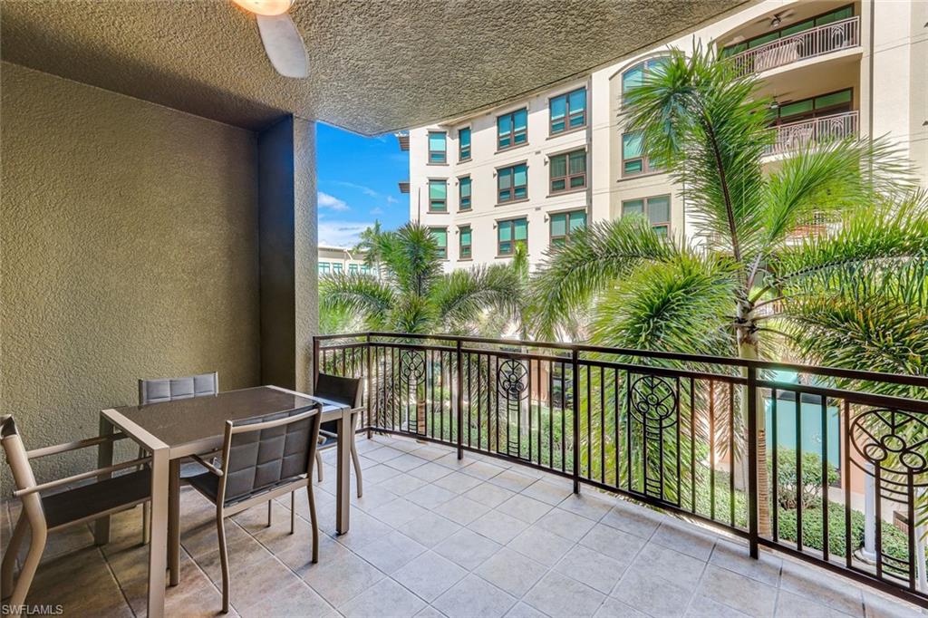 9123 Strada Place, Unit 7201 Naples, FL 34108 - Photo 19 of 50 a view of a balcony with furniture