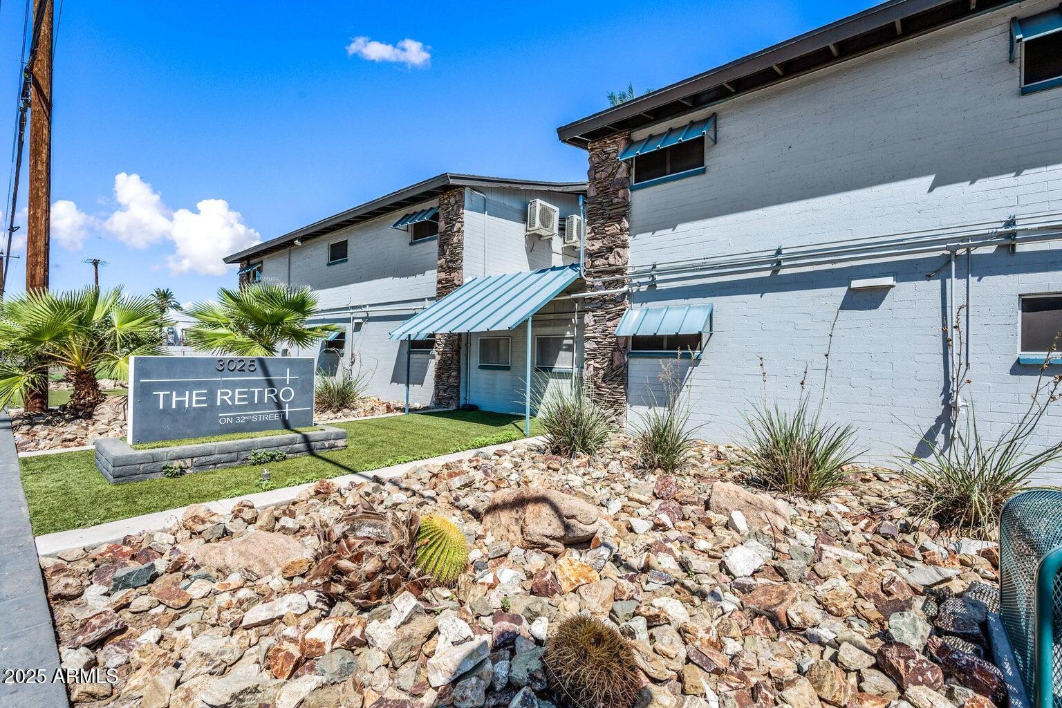 3025 North 32nd Street, Unit 10 Phoenix, AZ 85018 - Photo 1 of 21 a view of a house with a yard and sitting area