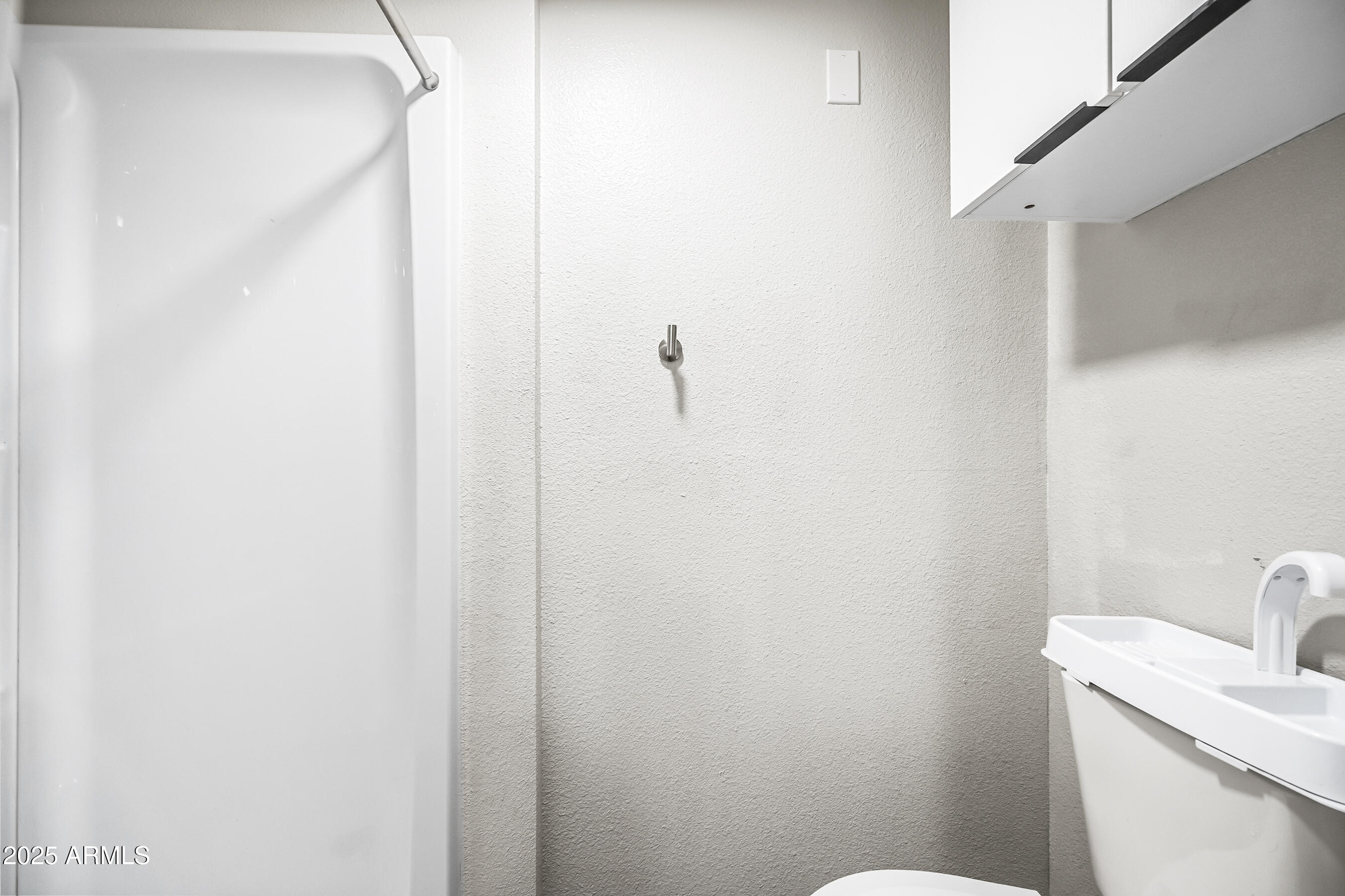 3025 North 32nd Street, Unit 10 Phoenix, AZ 85018 - Photo 10 of 21 a bathroom with a toilet and sink