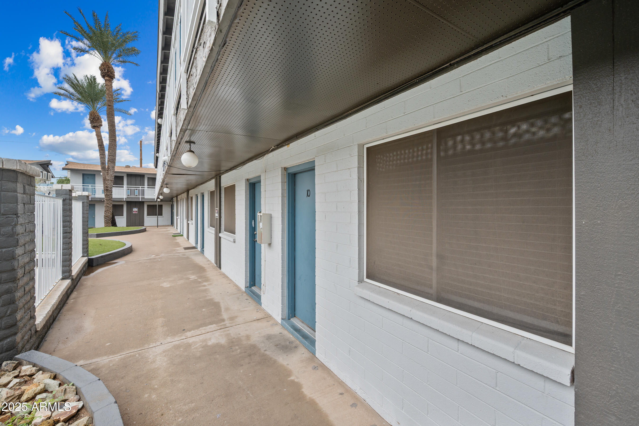 3025 North 32nd Street, Unit 10 Phoenix, AZ 85018 - Photo 2 of 21 a view of a porch
