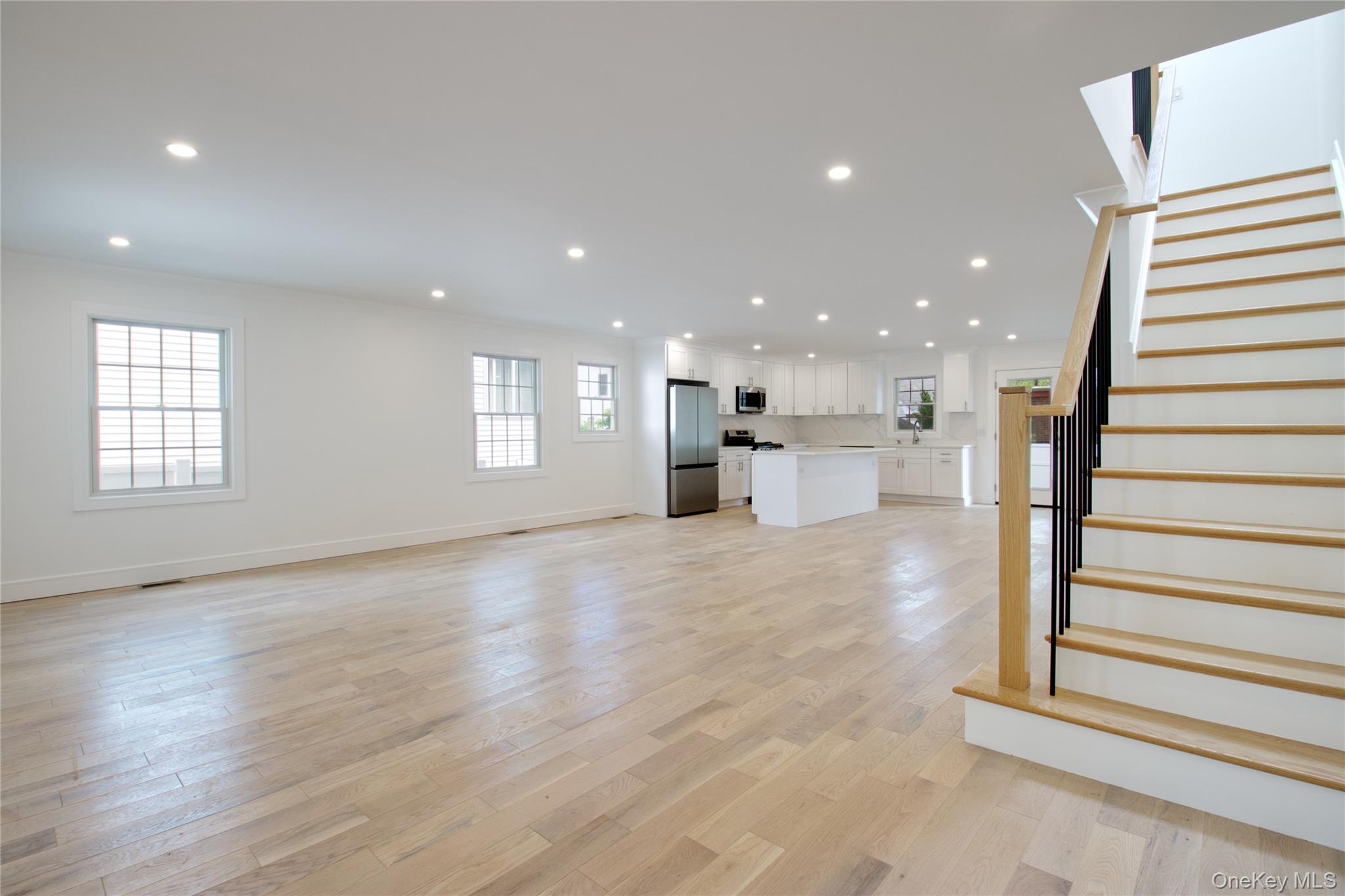 30 Kirkwood Road, Unit B Port Washington, NY 11050 - Photo 5 of 36 a view of entryway with wooden floor