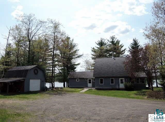 7775 South Spider Lake Road Iron River, WI 54847 - Photo 1 of 25 Lake home on 25 acres 900' water frontage