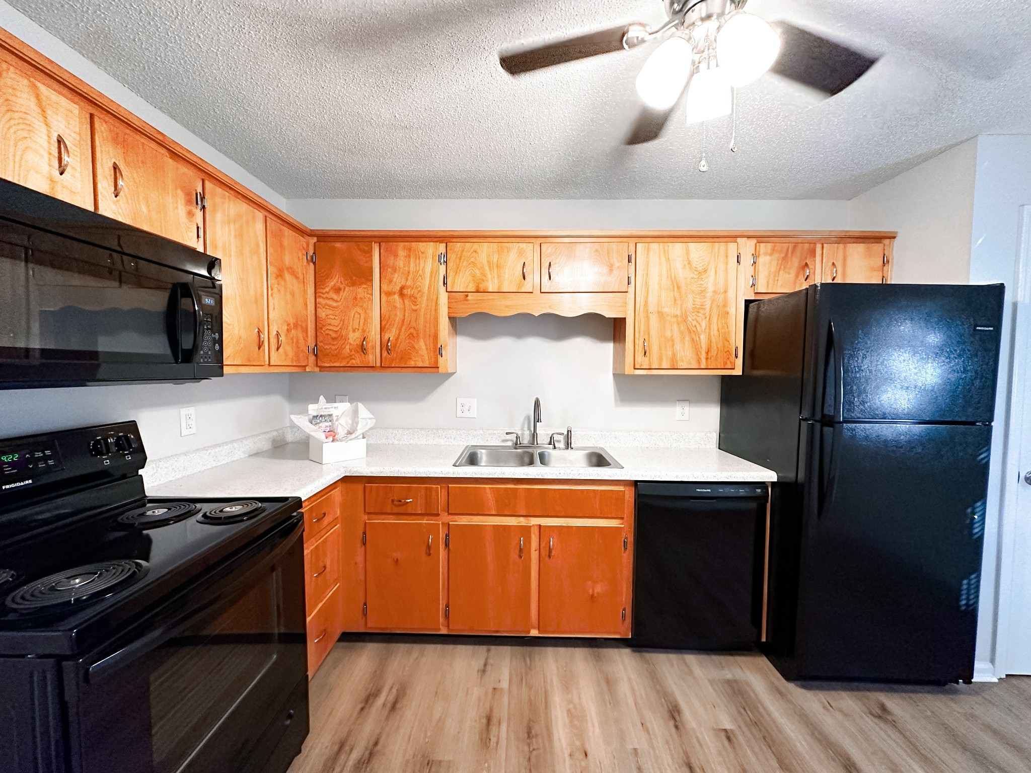 470 Martha Lane, Unit B Clarksville, TN 37043 - Photo 13 of 27 a kitchen with stainless steel appliances granite countertop a stove and a refrigerator