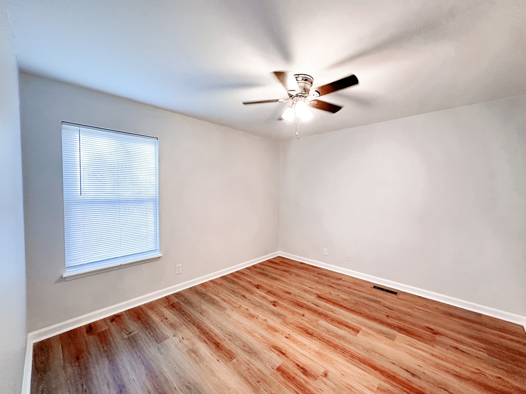 470 Martha Lane, Unit B Clarksville, TN 37043 - Photo 17 of 27 a view of empty room with wooden floor