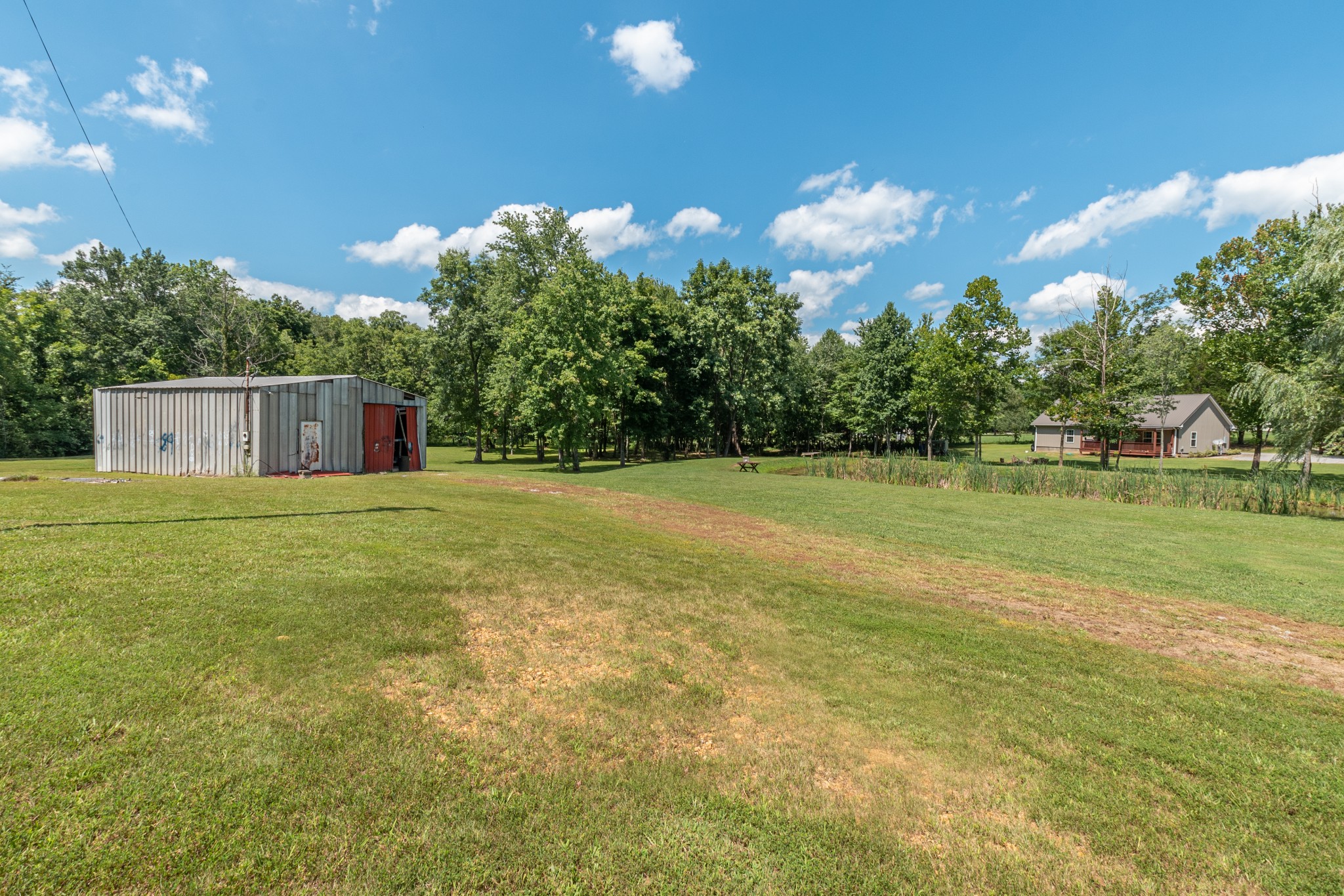 502 Airport Road Portland, TN 37148 - Photo 30 of 30 a view of a house with a big yard