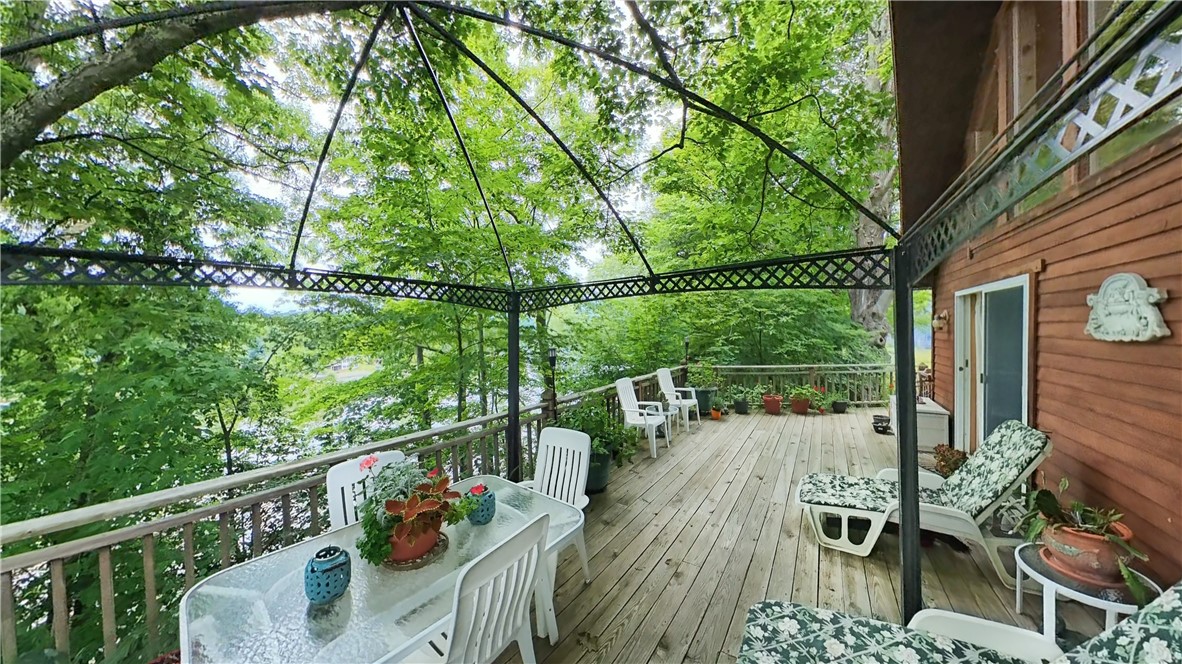 138 Vito Molinari Road Oneonta, NY 13820 - Photo 36 of 38 Filtered views on the shaded balcony