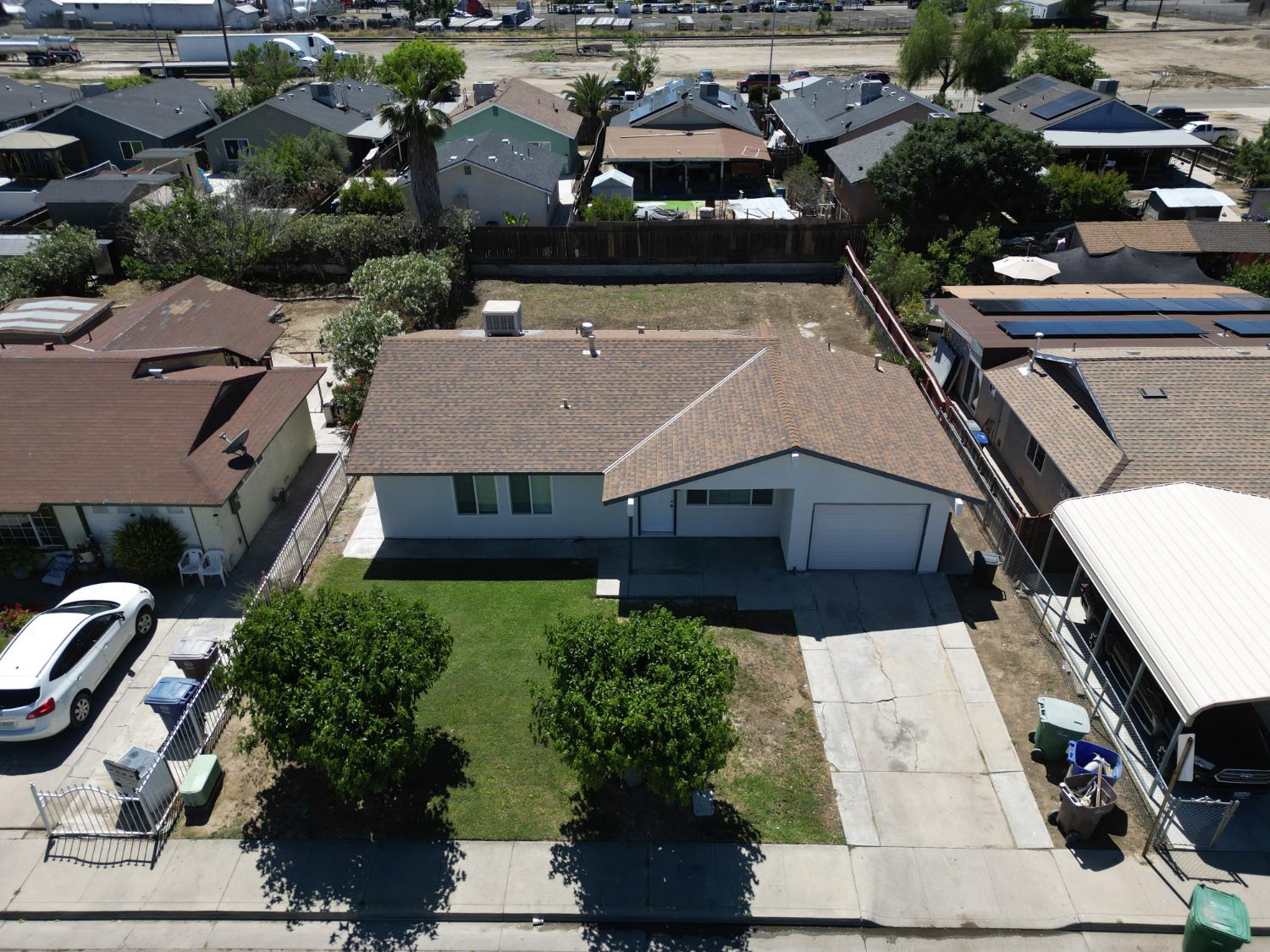 266 L Street Mendota, CA 93640 - Photo 4 of 21 an aerial view of a house with a yard