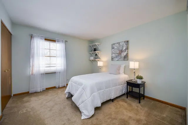 a view of an empty room with stairs