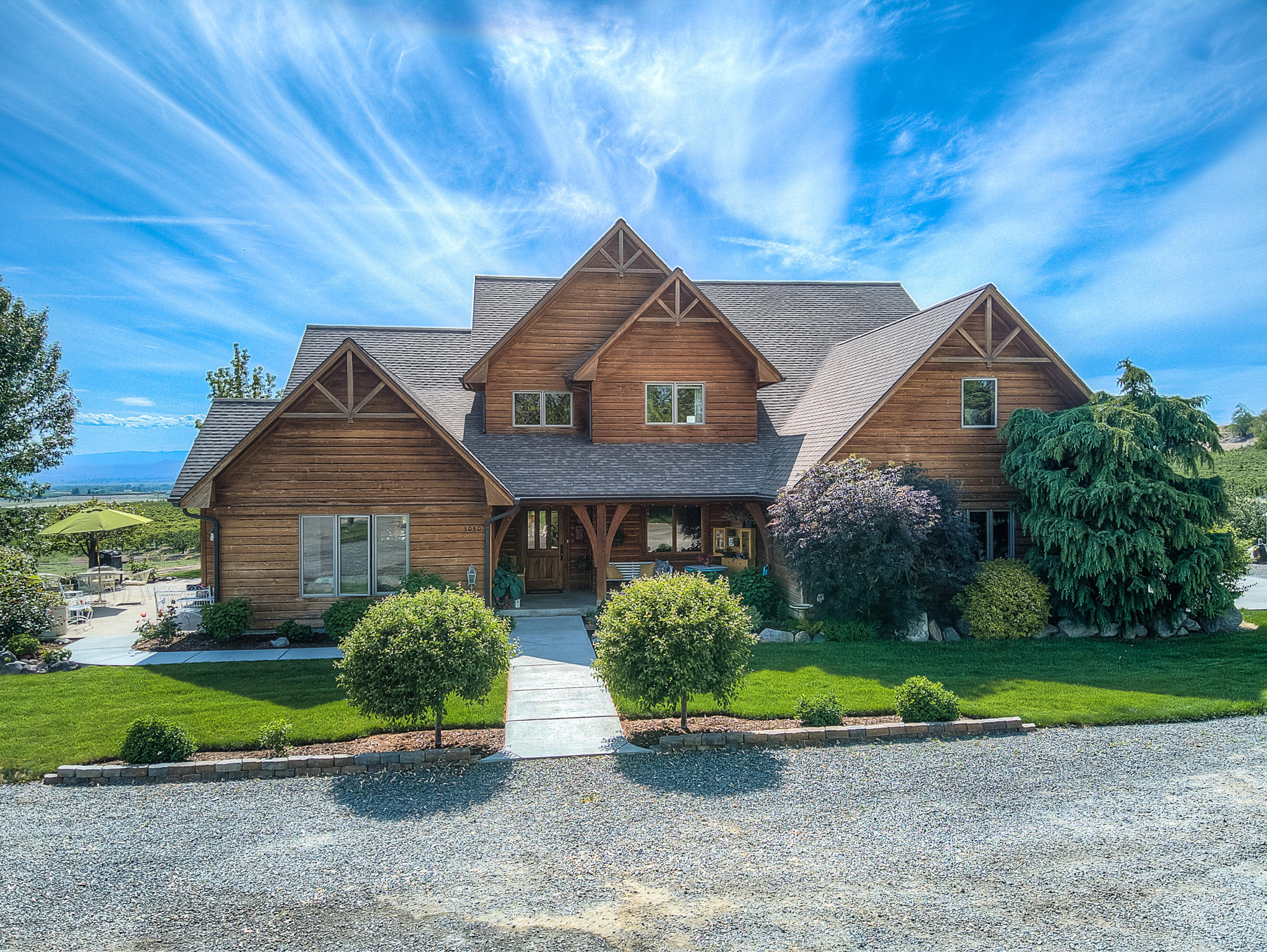 3050 Thacker Road Zillah, WA 98953 - Photo 1 of 64 a front view of a house with a yard