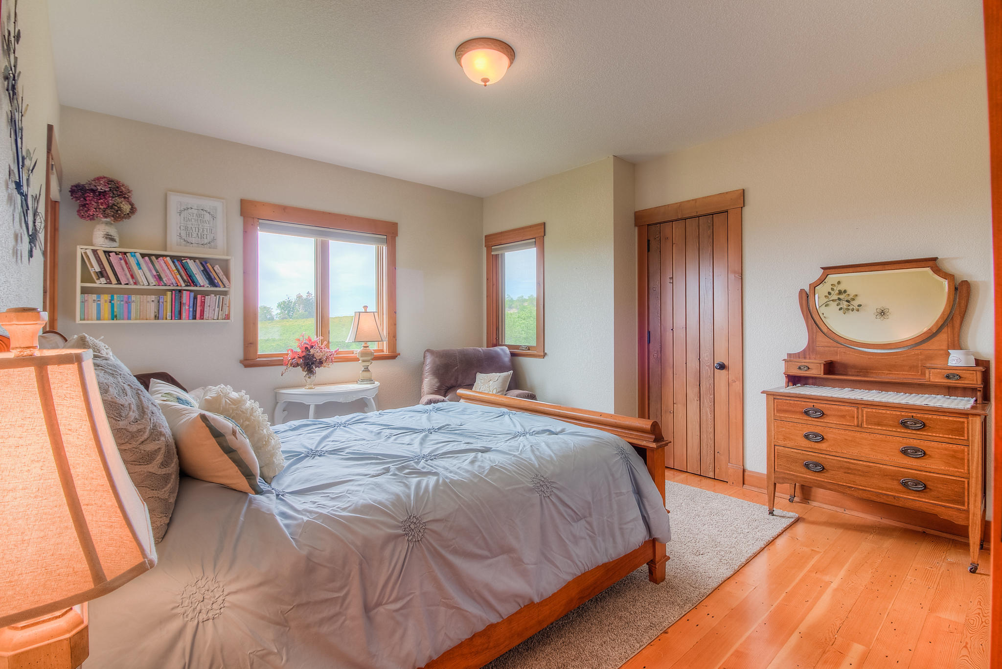 3050 Thacker Road Zillah, WA 98953 - Photo 34 of 64 a bed room with a bed and a dresser