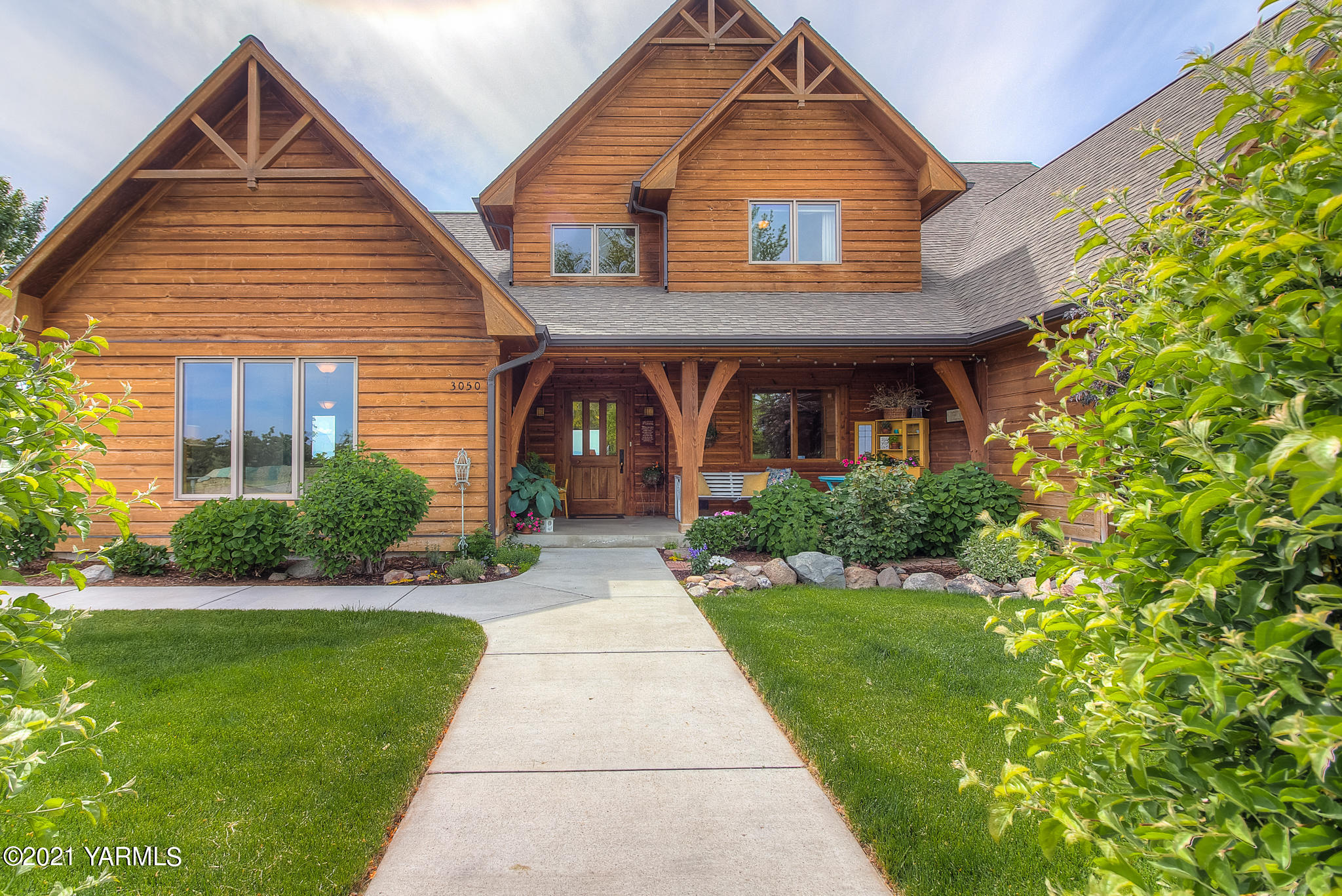 3050 Thacker Road Zillah, WA 98953 - Photo 50 of 64 a front view of a house with a yard