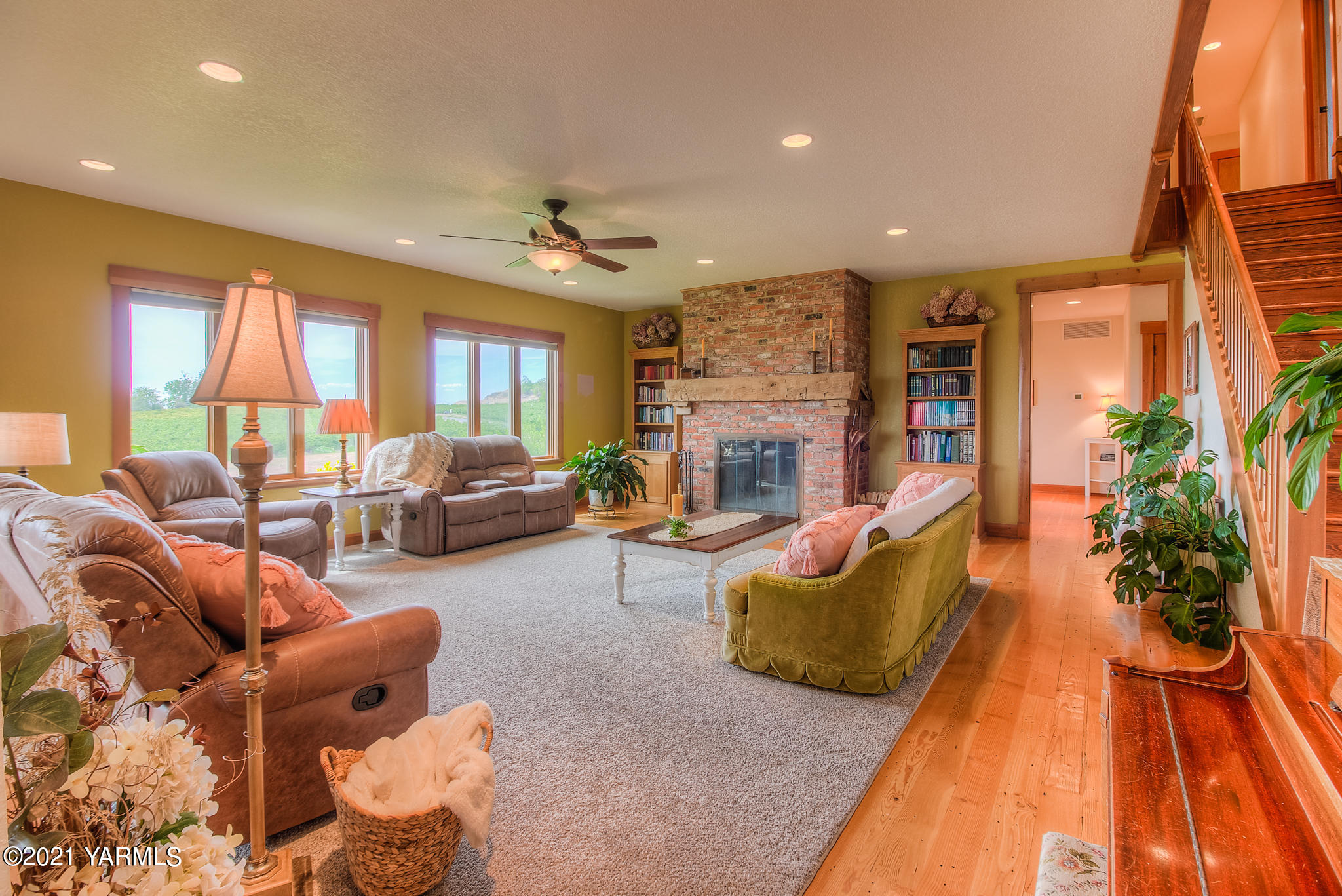 3050 Thacker Road Zillah, WA 98953 - Photo 6 of 64 a living room with furniture or couch and a fireplace