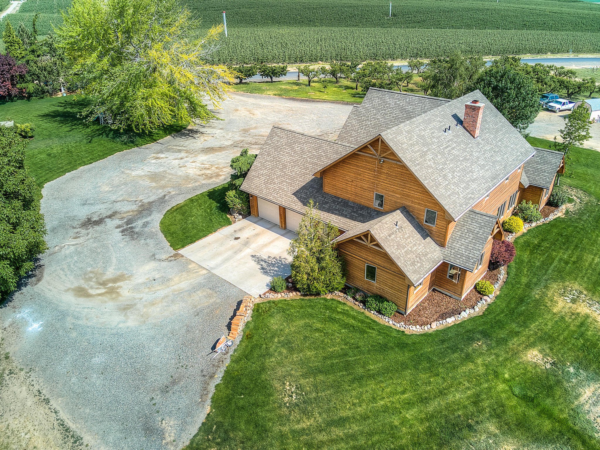 3050 Thacker Road Zillah, WA 98953 - Photo 58 of 64 an aerial view of a house with a yard and lake view