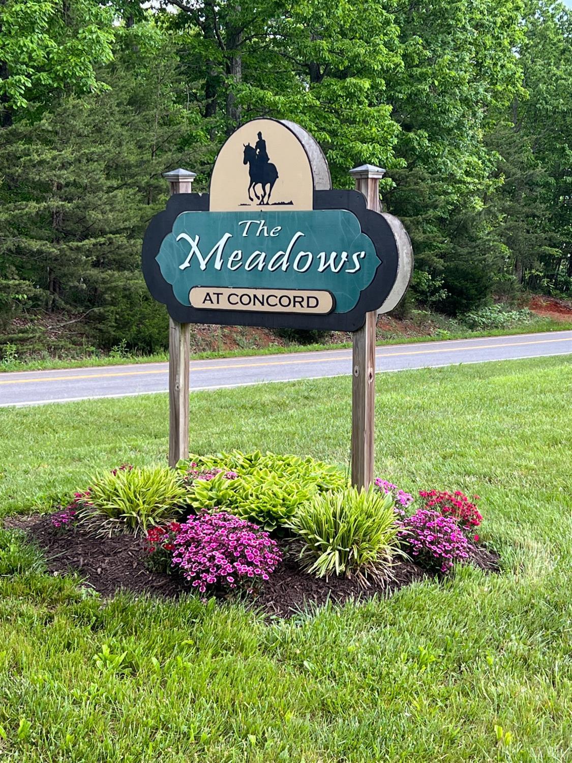 566 White Tail Road Concord, VA 24538 - Photo 13 of 25 a view of a sign sitting in the garden