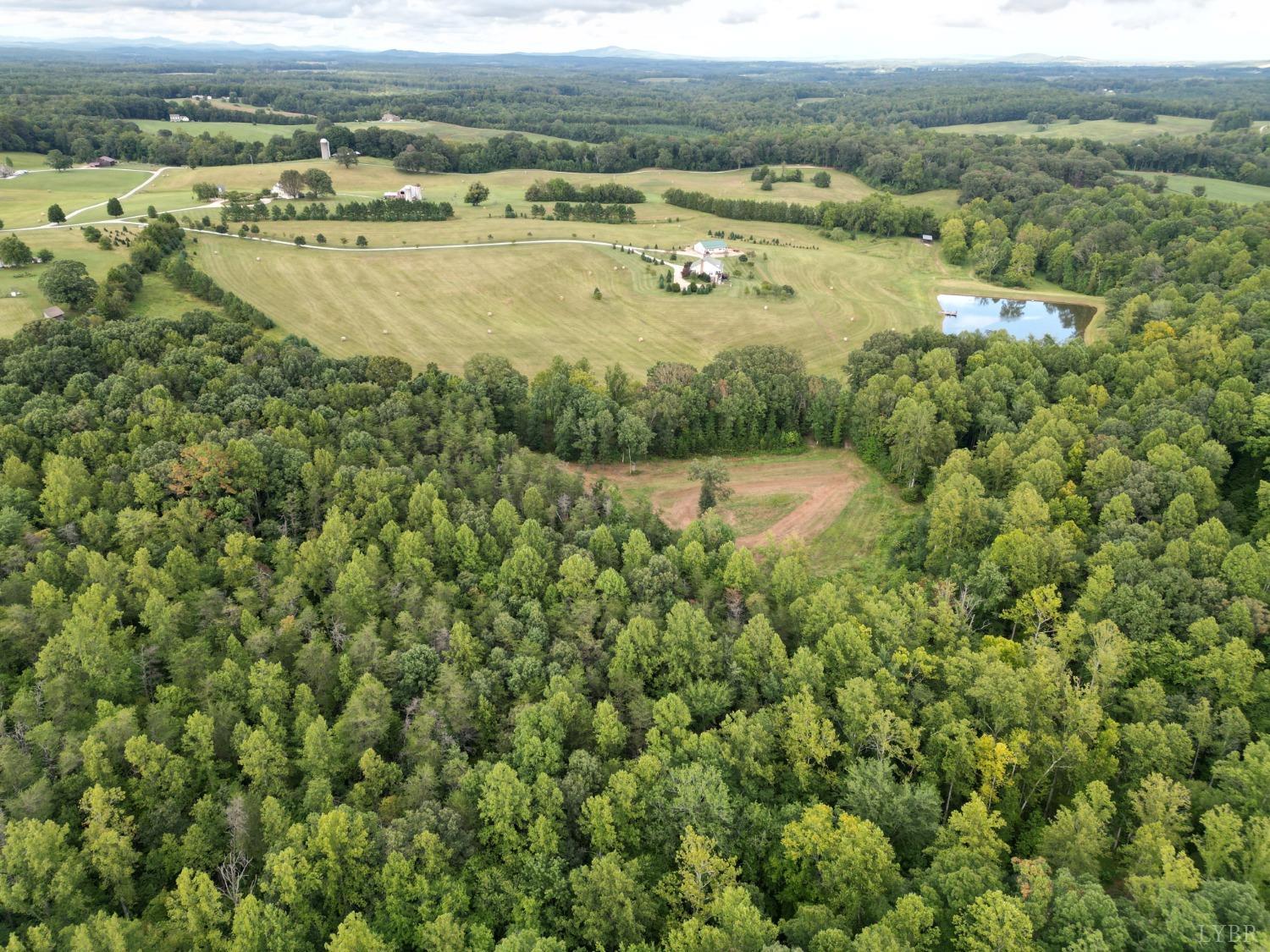 566 White Tail Road Concord, VA 24538 - Photo 2 of 25 a view of a lake with houses