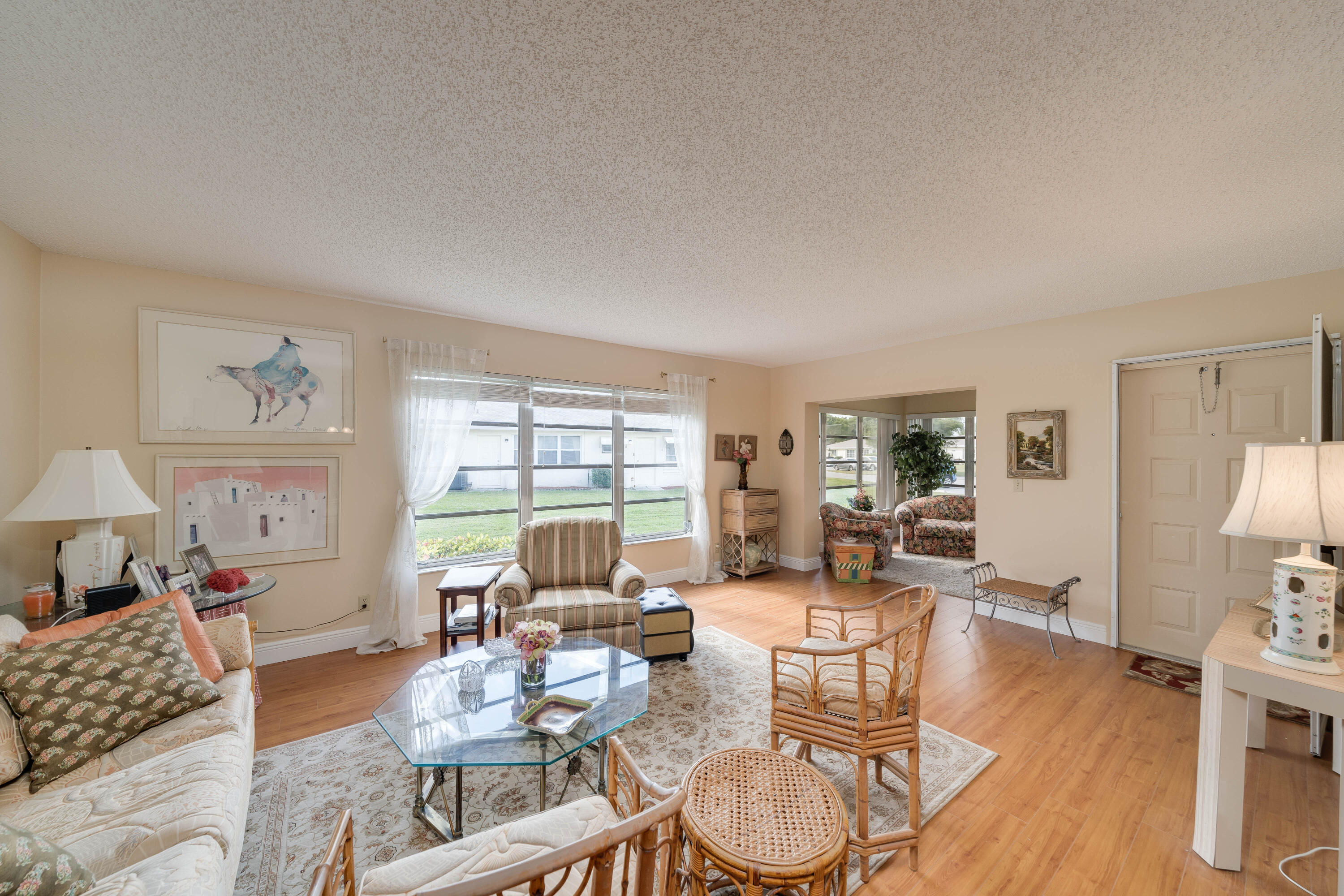 14240 Nesting Way, Unit D Delray Beach, FL 33484 - Photo 14 of 45 a living room with furniture and wooden floor