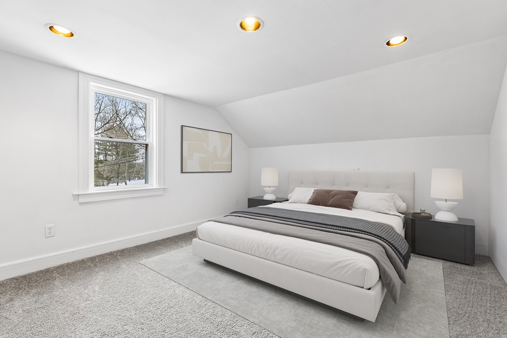 597 Mendon Road Northbridge, MA 01534 - Photo 11 of 13 a bedroom with a bed and a window