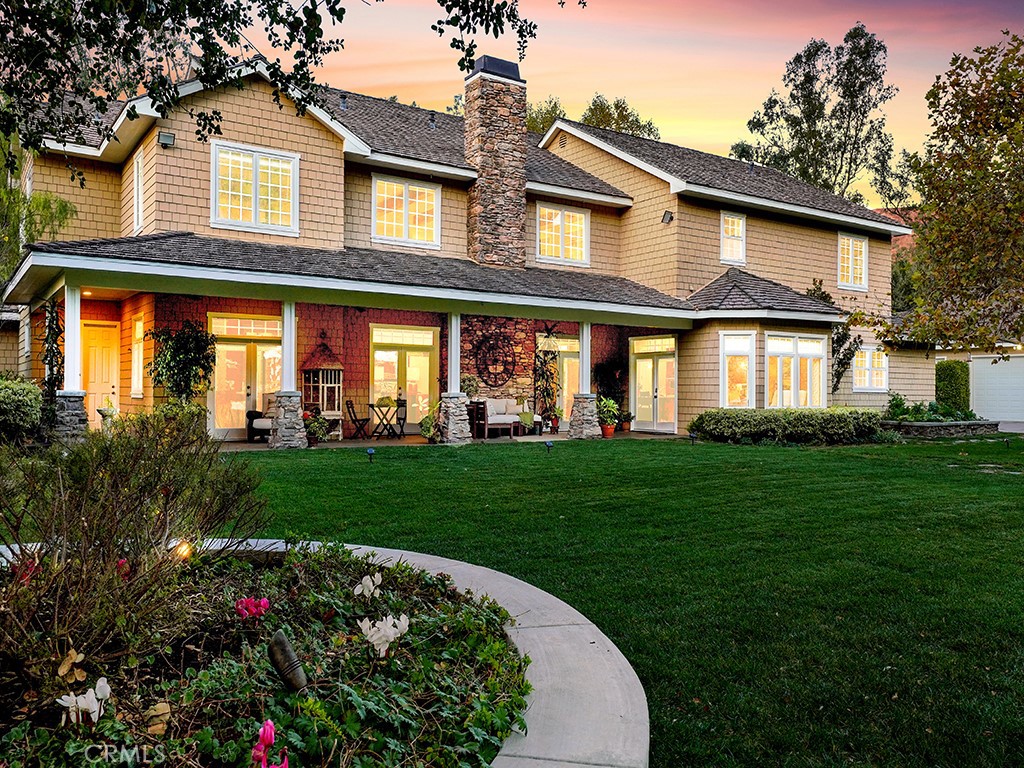 28291 Williams Canyon Road Silverado, CA 92676 - Photo 4 of 74 a front view of a house with a garden and pathway