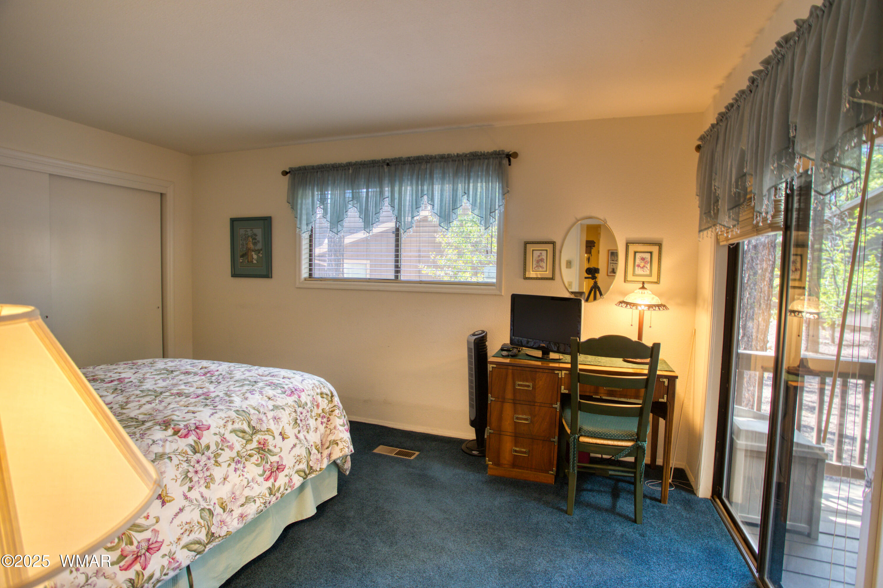 2836 Oak Circle Pinetop, AZ 85935 - Photo 12 of 35 Bedroom Downstairs with sliding glass doors to spacious patio