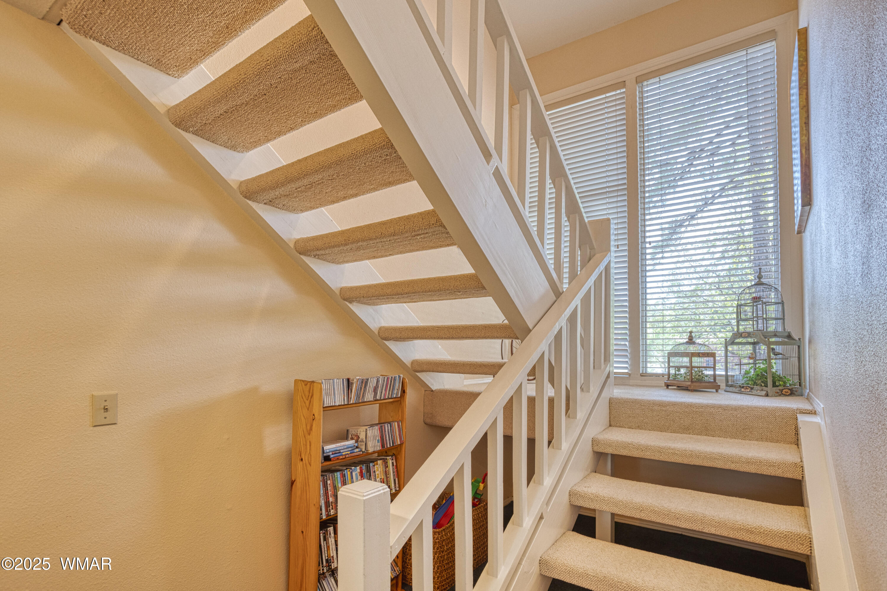 2836 Oak Circle Pinetop, AZ 85935 - Photo 15 of 35 Staircase going upstairs with large picture windows giving lots of natural light