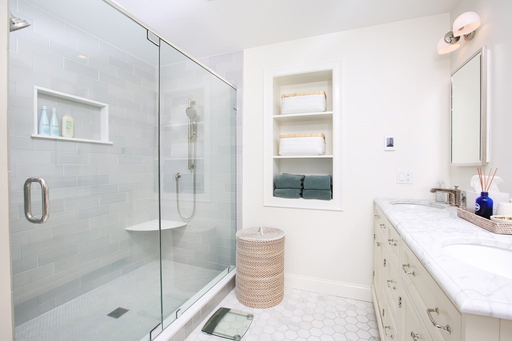 62 Sullivan Street, Unit 1 Boston, MA 02129 - Photo 6 of 11 a bathroom with a sink a toilet and shower