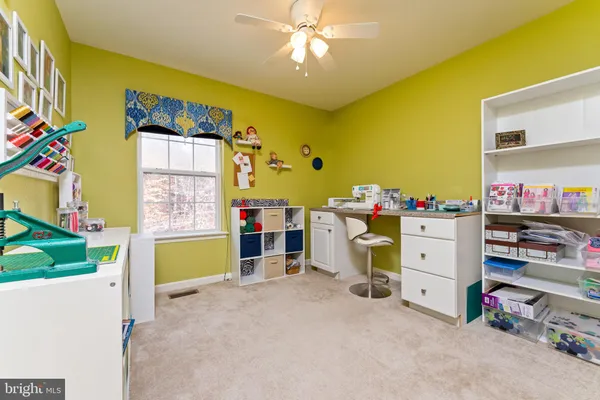 a view of a bedroom with toys and toys